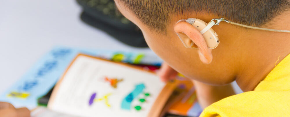 learner with a hearing aid